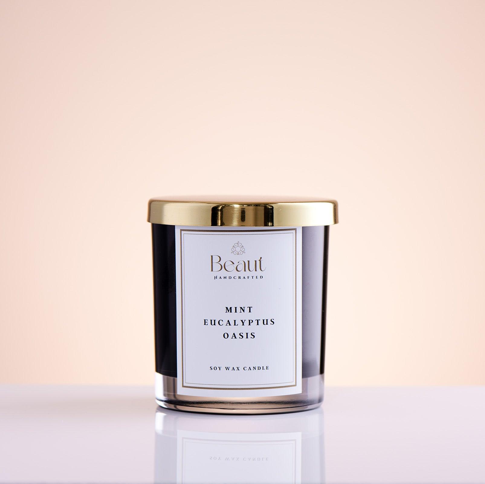 Mint Eucalyptus Oasis Soy Candle in the glass container