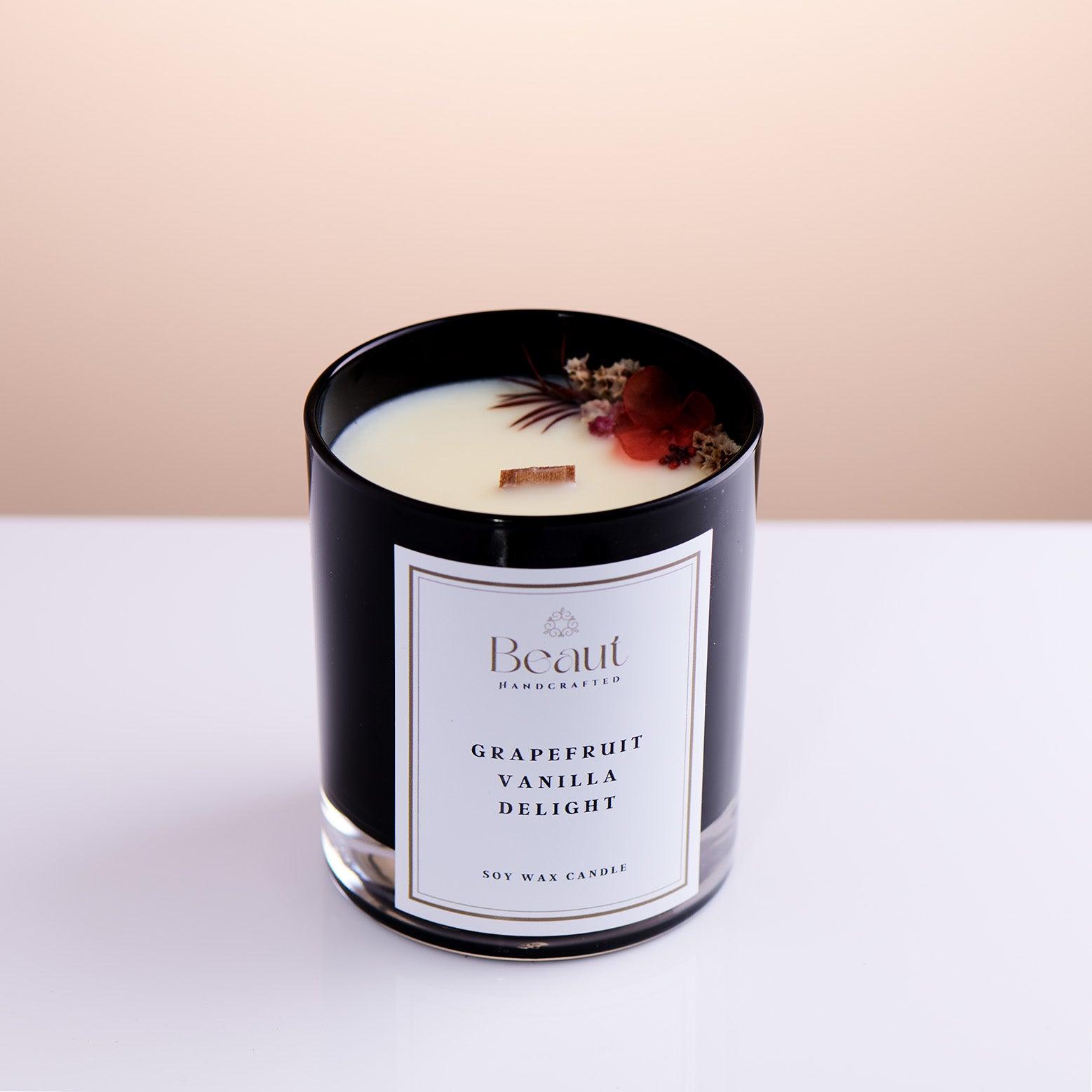 colourful design on the soy wax candle hand made and decorates in black jar with white lable