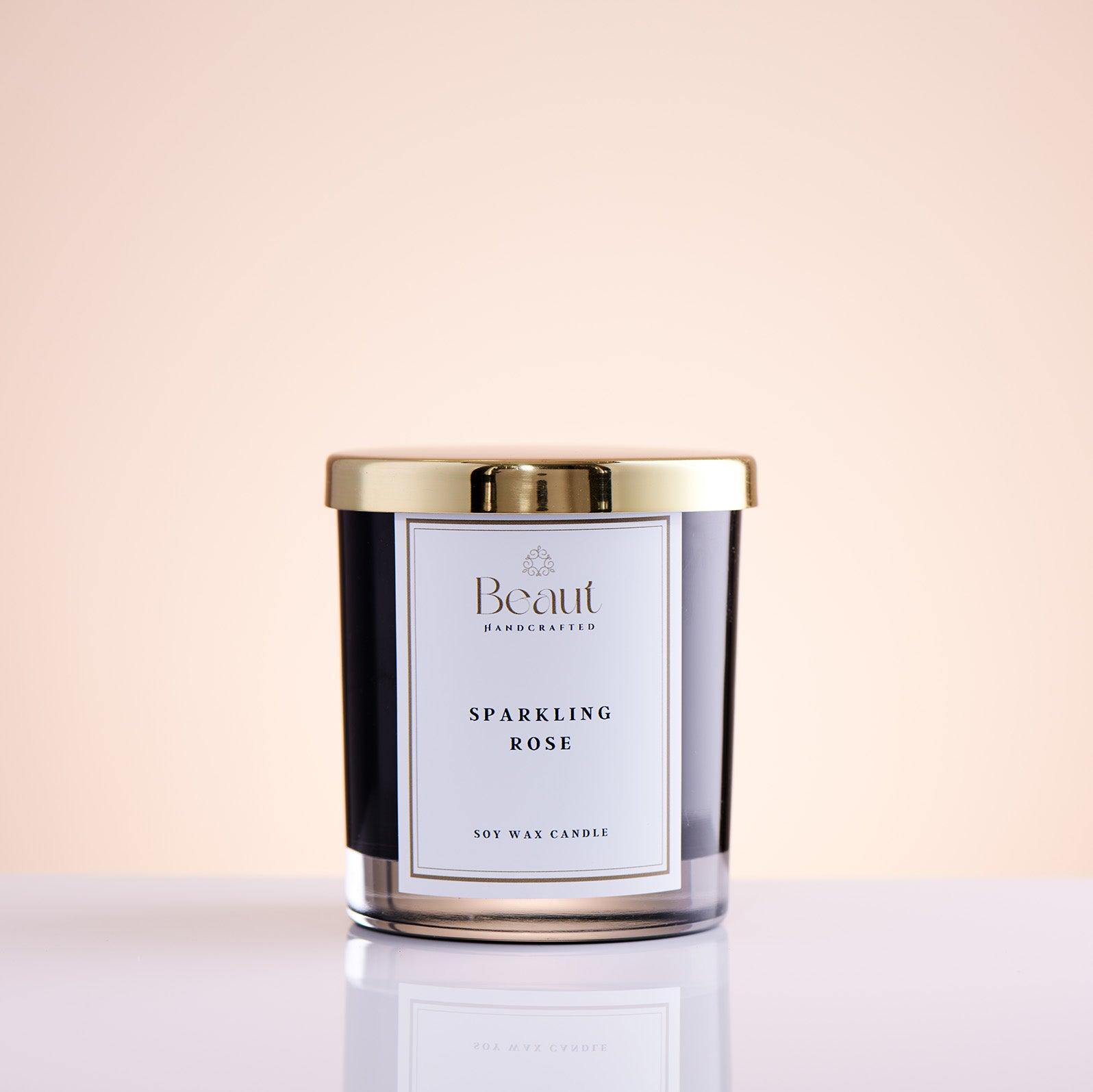 Sparkling Rose Soy wax Candle in the glass container