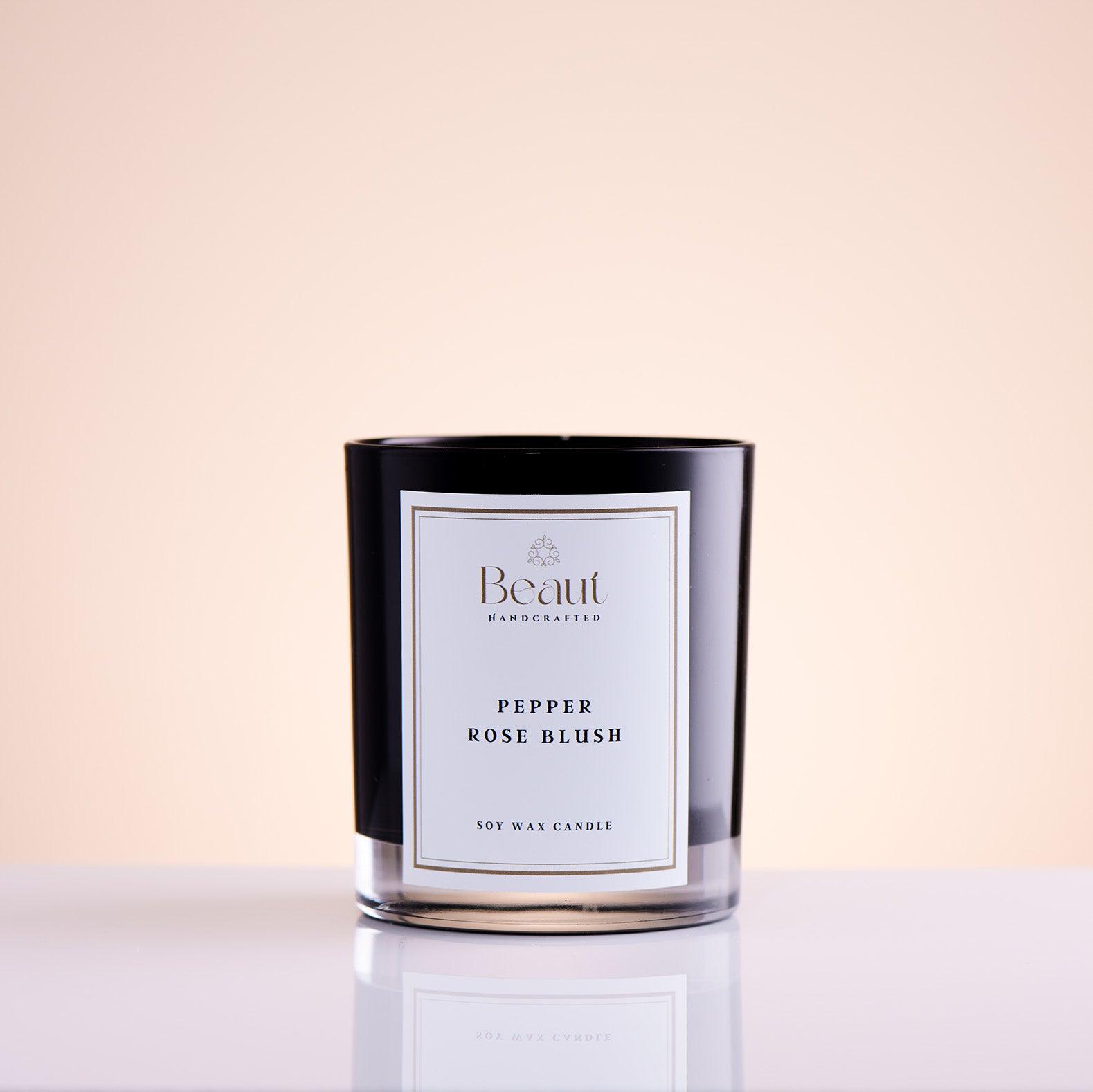 soy wax candle decorated with white roses made from wax, wooden wick is in the middle of the candle