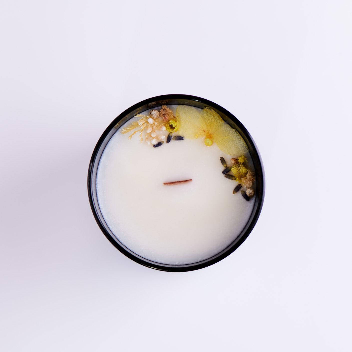 Chamomile Vanilla Bliss Soy Wax Candle in the glass container
