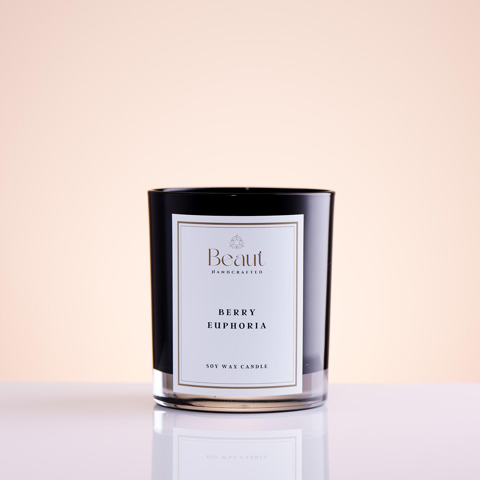Berry Euphoria Soy Wax Candle in the glass container