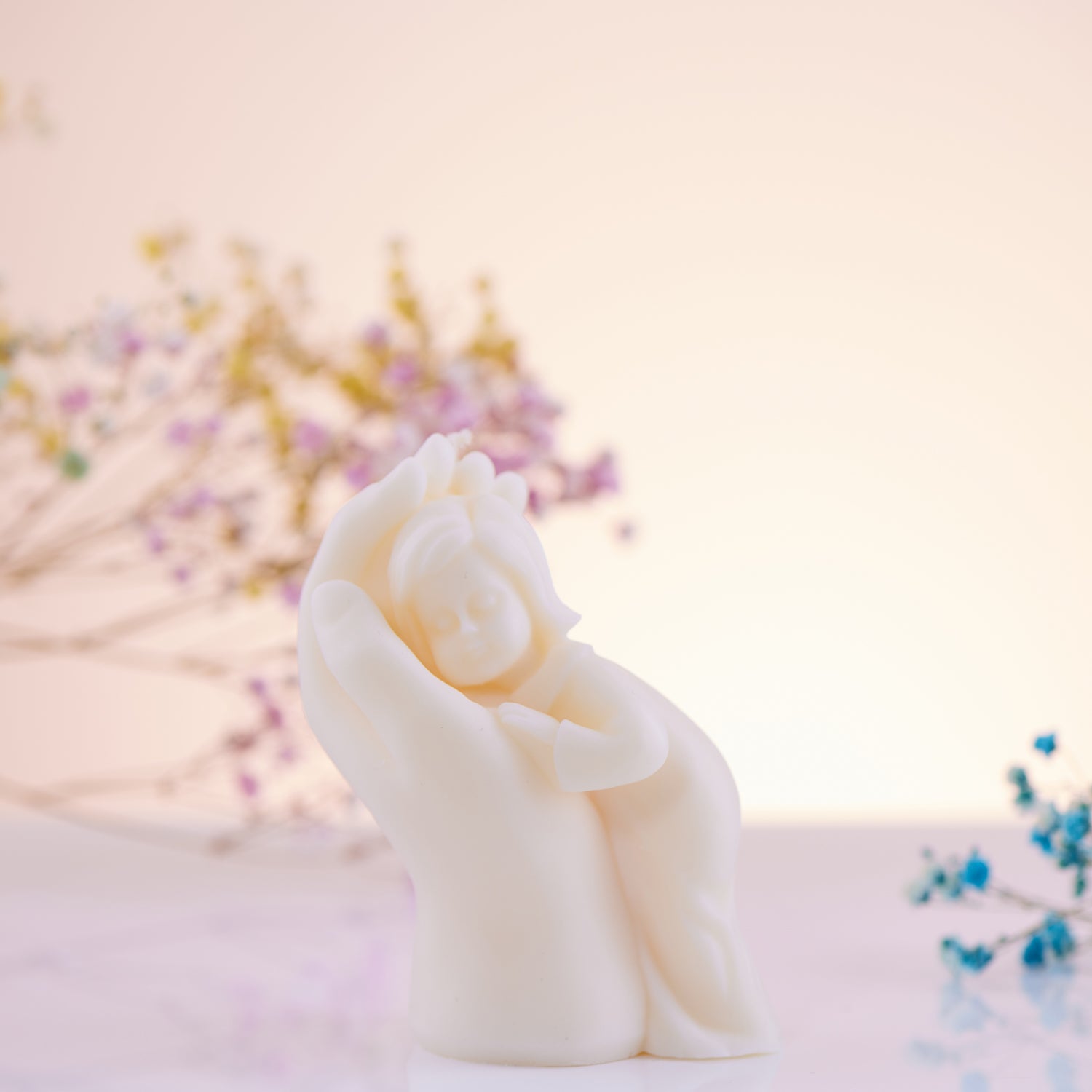 Baby in Hand Candle