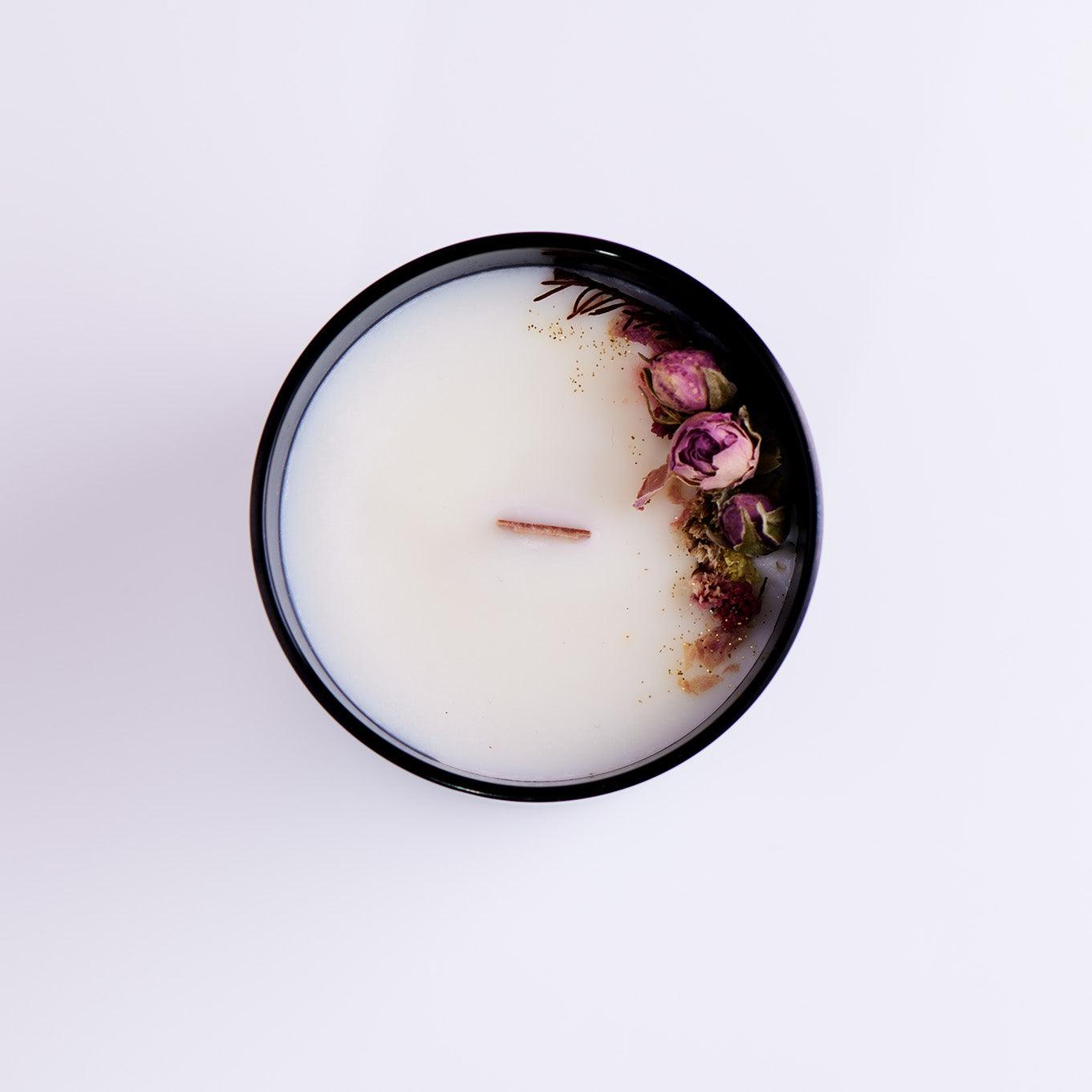 Sparkling Rose Soy wax Candle in the glass container