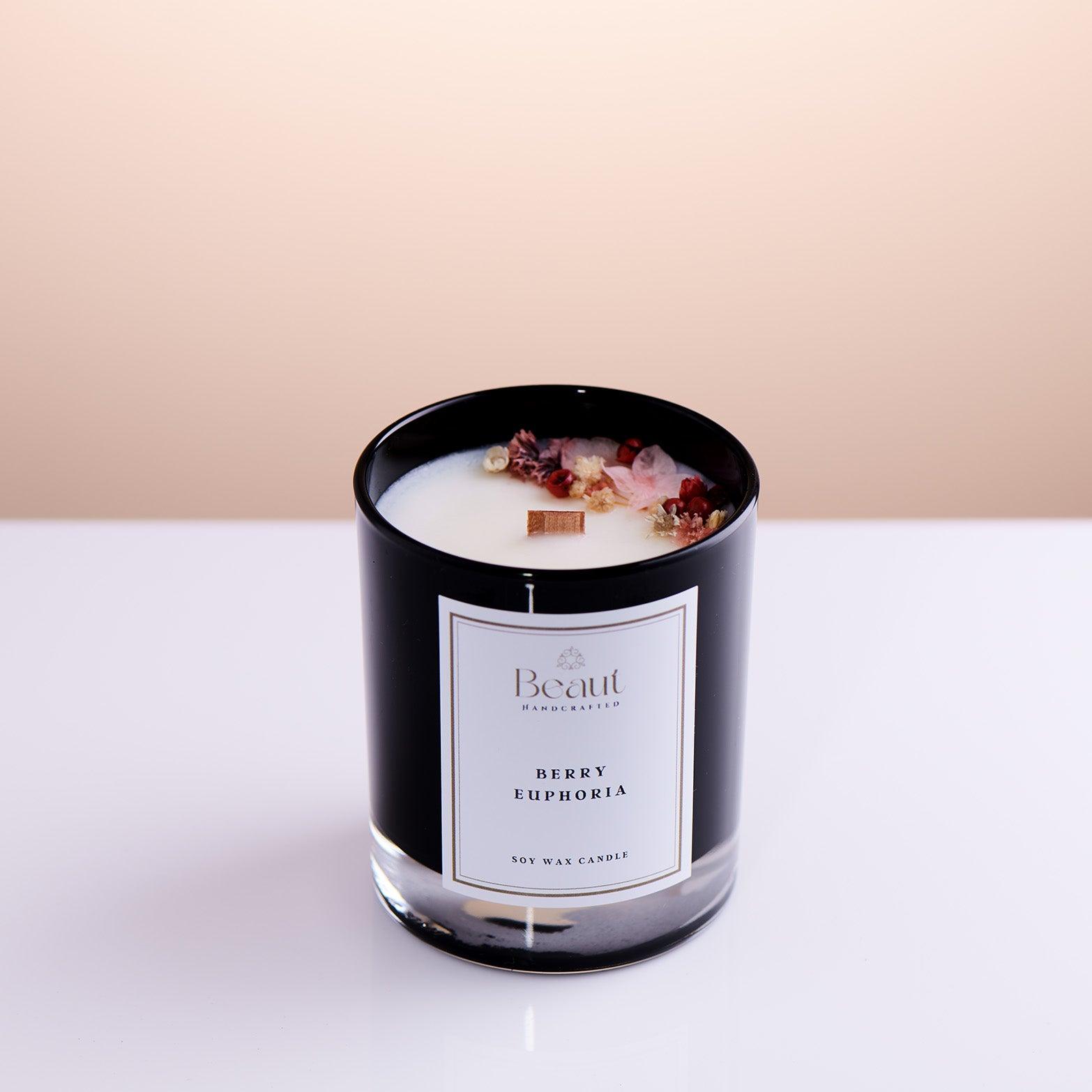 Berry Euphoria Soy Wax Candle in the glass container